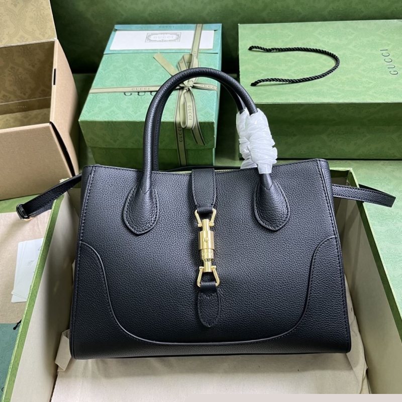 G*u*i top handle bags